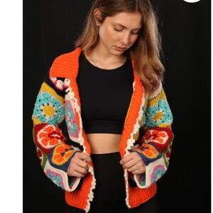 New - never worn. Handmade Crochet cardigan. No tags, but Size Medium.